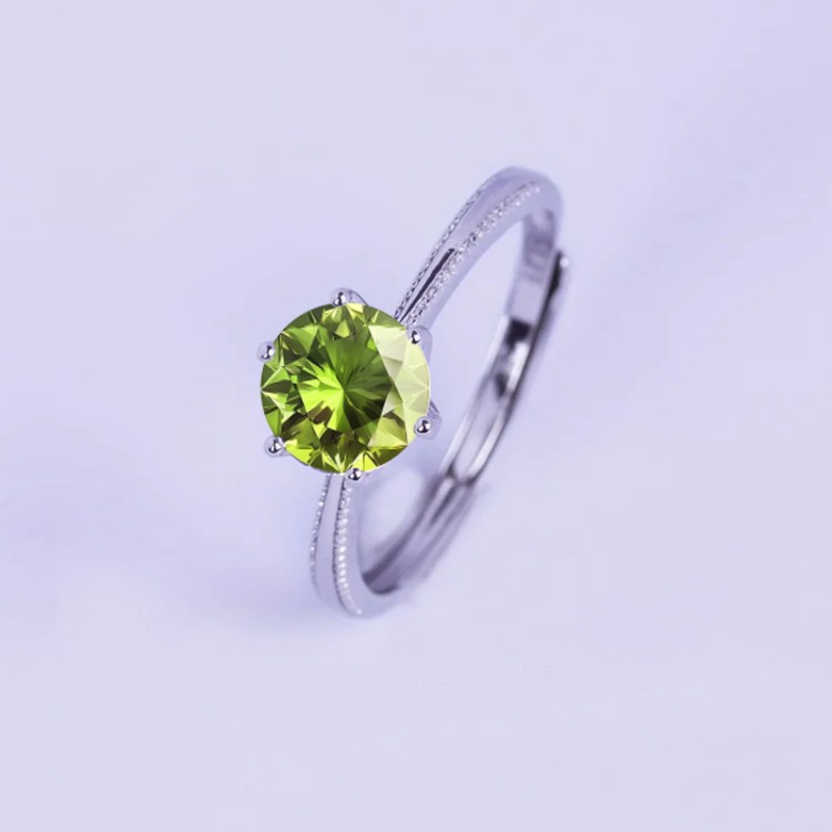 Anillo de compromiso en plata detalle de borde efecto perlado con peridoto Anillo de compromiso en plata detalle de borde efecto perlado con peridoto