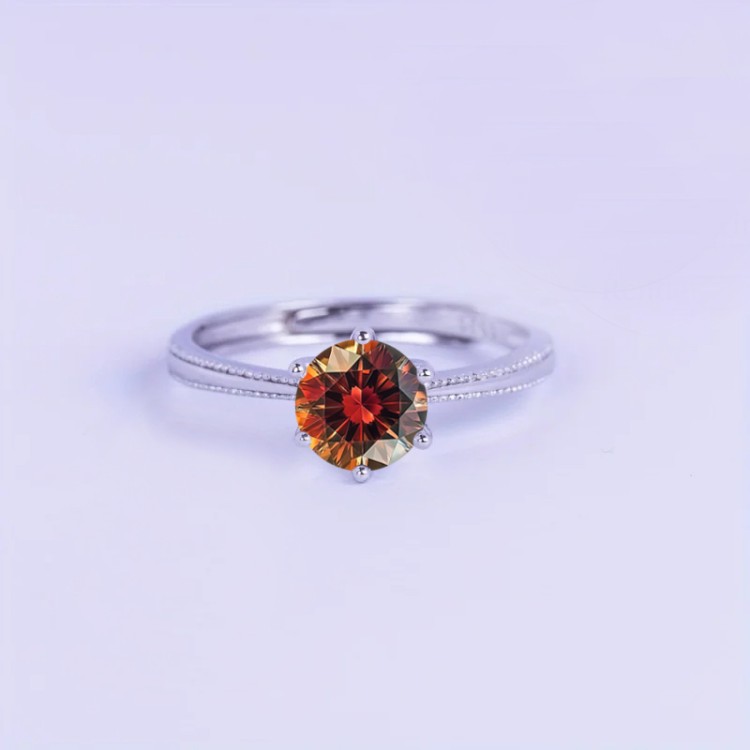 Anillo de compromiso en plata detalle de borde efecto perlado con granate Anillo de compromiso en plata detalle de borde efecto perlado con granate