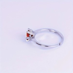 Anillo de compromiso en plata copo de corazones con granate