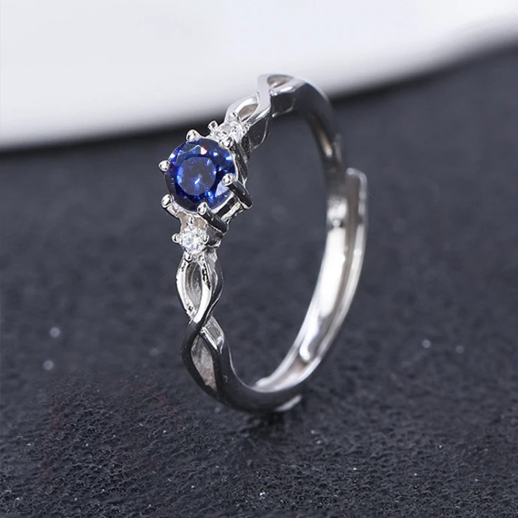 Anillo de compromiso en plata clásico infinito con zafiro Anillo de compromiso en plata clásico infinito con zafiro