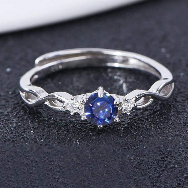 Anillo de compromiso en plata clásico infinito con zafiro
